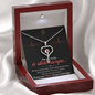 Lighted wood-tone luxury jewelry box with stethoscope necklace and nurse message card