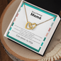 Latina mom wearing interlocking hearts necklace from daughter