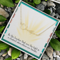 Signature font name necklace displayed with message card