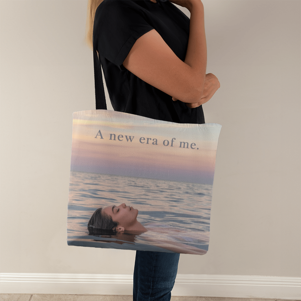 Woman carrying self love growth quote canvas tote bag
