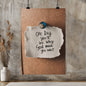 Inspirational handwritten faith quote on corkboard background