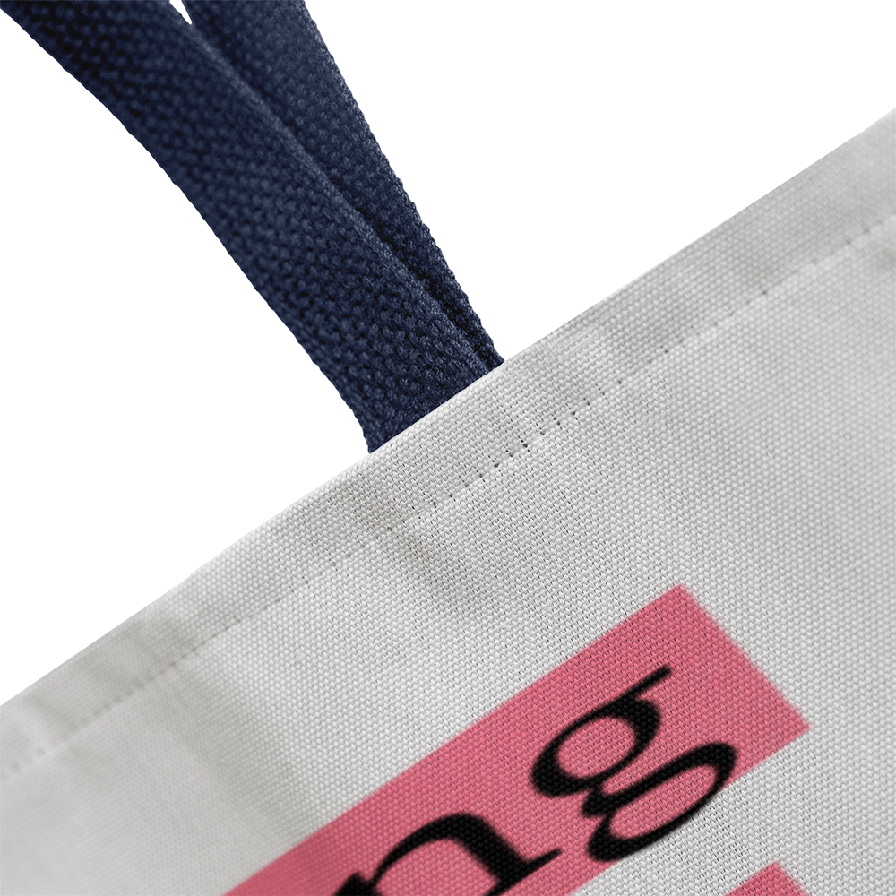 Faith-inspired tote bag photographed near cozy coffee shop window with Bible and latte, representing peaceful devotion.