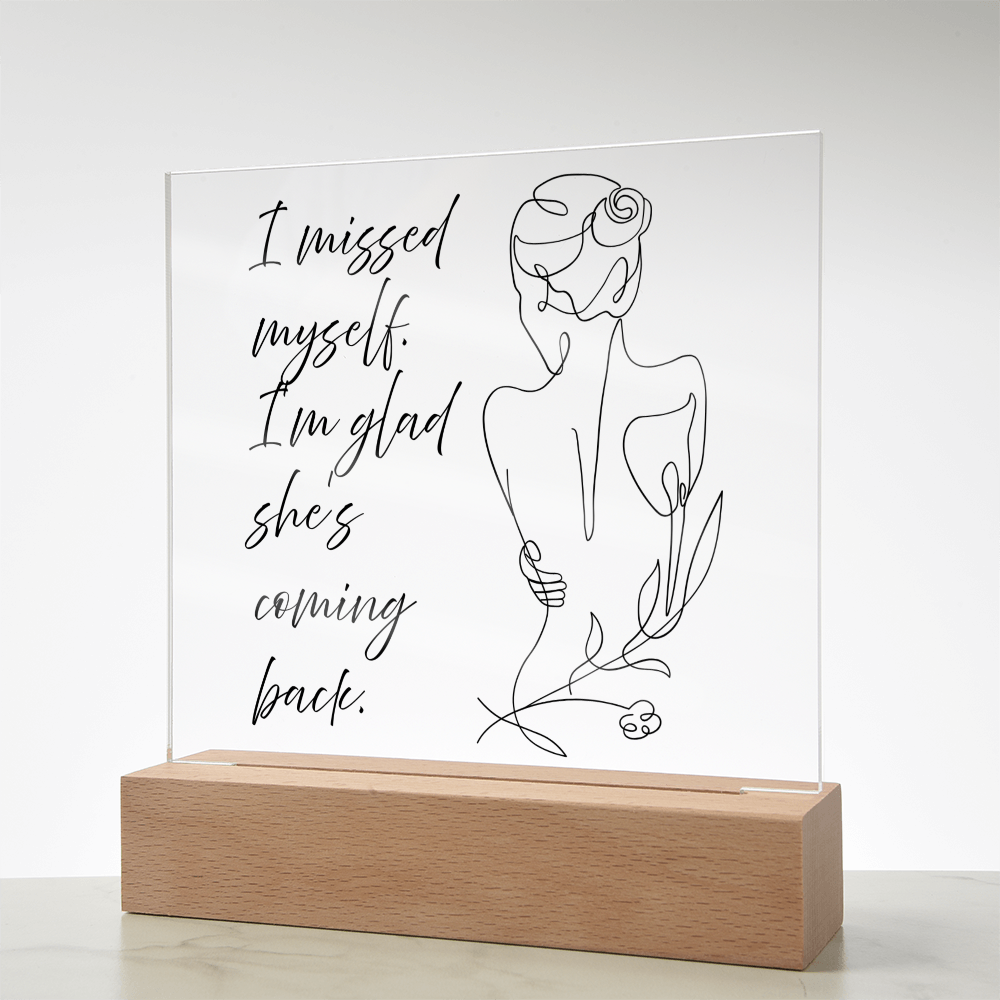 “I Missed Myself — She’s Coming Back” LED light frame styled in cozy modern décor