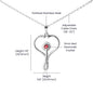 Inspirational stethoscope necklace displayed on woman in scrubs, symbolizing strength and compassion.