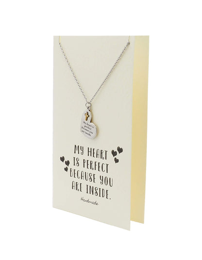 Necklace with heart-shaped pendant on a card with text, on a white background