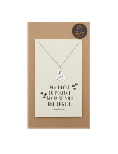 Necklace with a pendant on a card with text, displayed on a brown box.