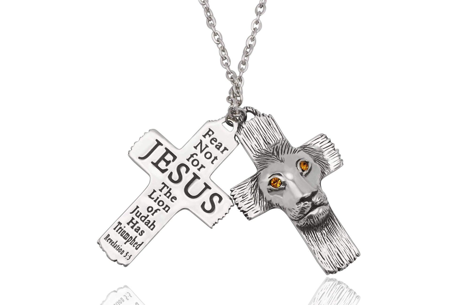 Silver cross necklace with lion head and 'Jesus' text on a white background