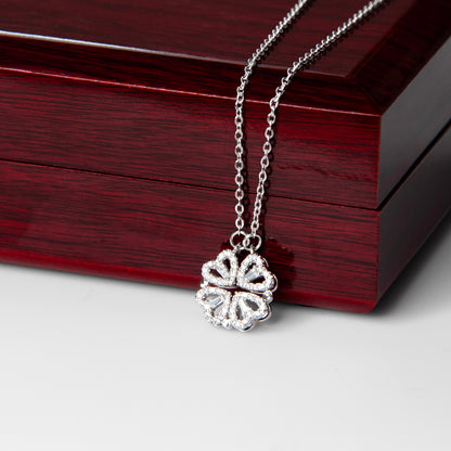 mother wearing sentimental four heart necklace