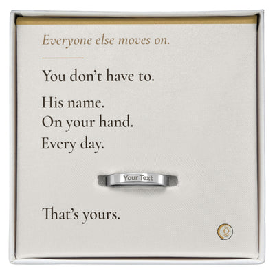 engraved dog memorial ring for grieving pet owner