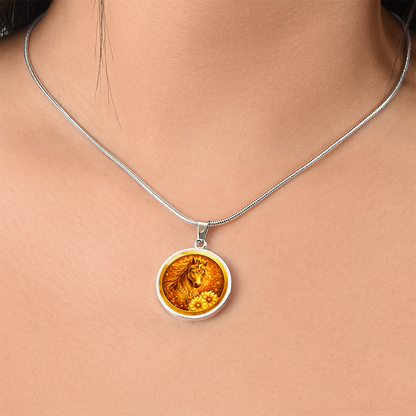 Close-up of golden horse pendant circular design