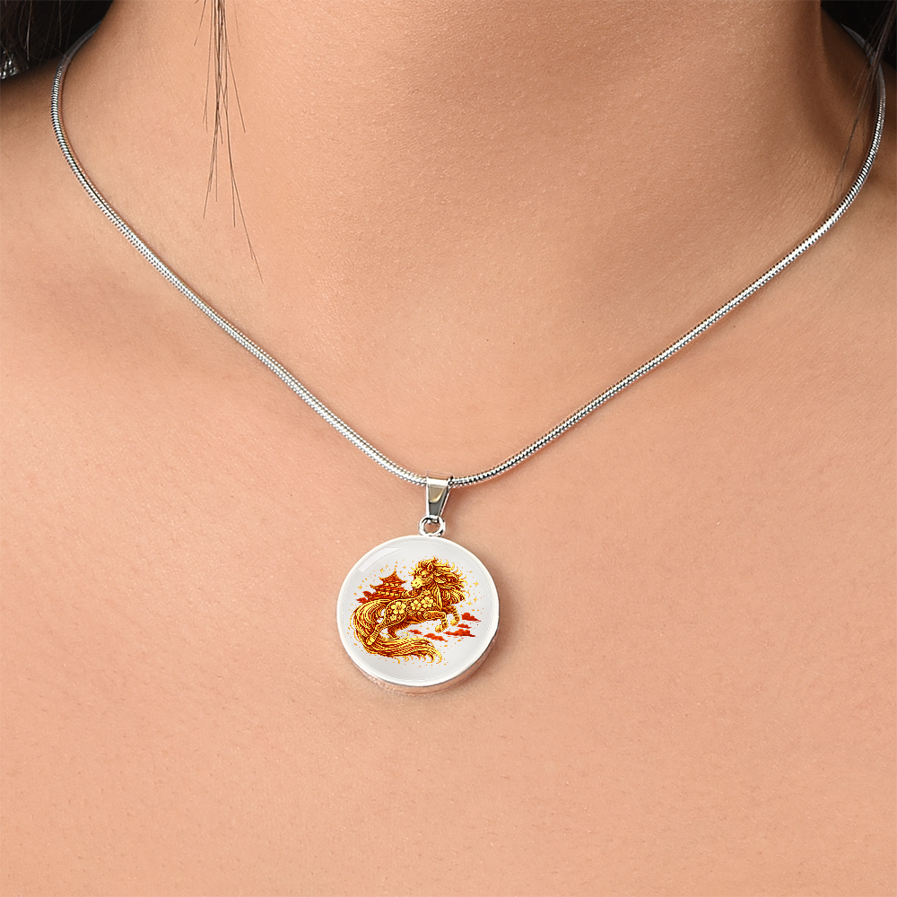 Close-up of golden horse circle pendant engraving