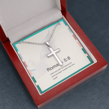 Christian cross necklace displayed on clean, neutral background