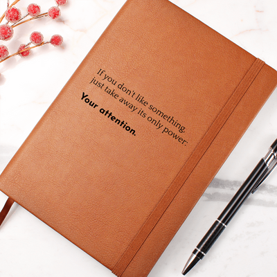 Close-up of vegan leather journal with elastic band and ribbon bookmark