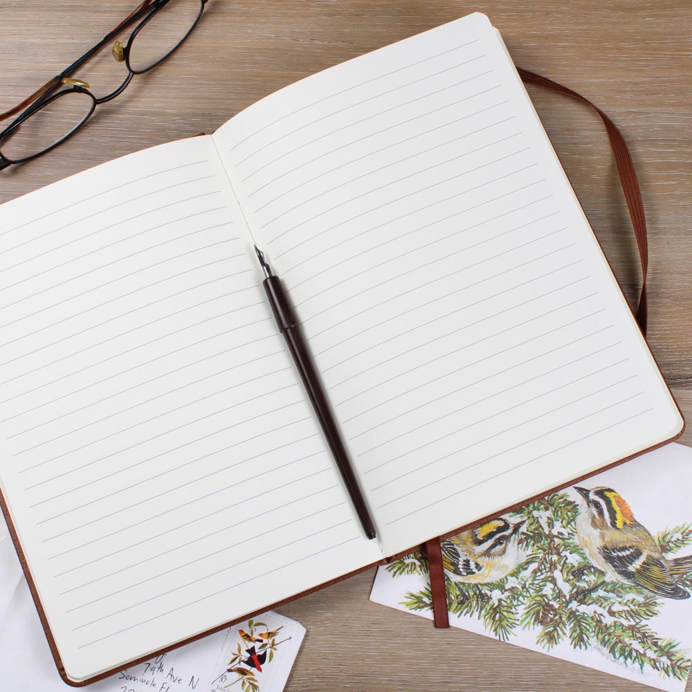 nurse writing in journal during break