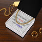Necklace displayed in soft-touch gift box with faith message