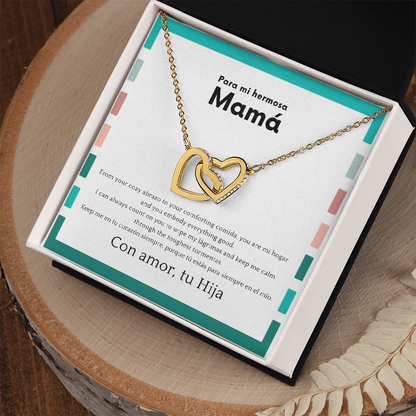 Latina mom wearing interlocking hearts necklace from daughter
