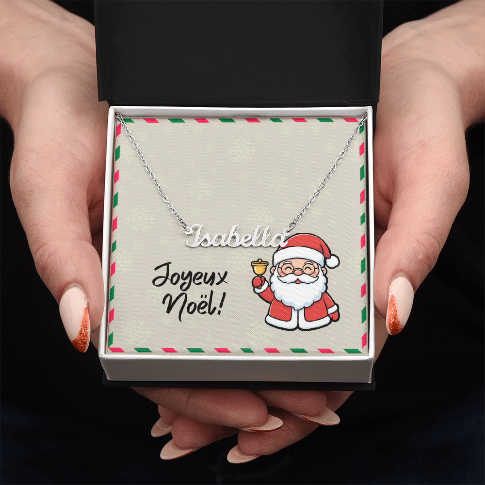 Close-up of Joyeux Noël cursive name necklace on gift card