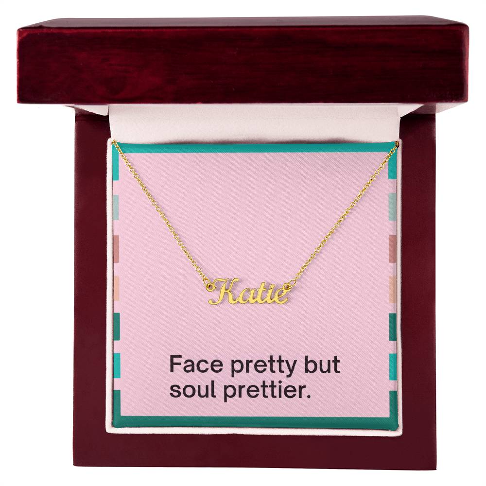 Close-up of custom name pendant letters in 18k yellow gold finish