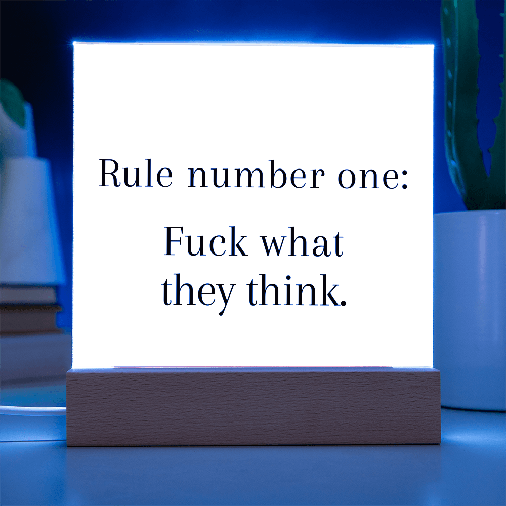 Motivational LED plaque glowing softly on nightstand as confidence-boosting decor.