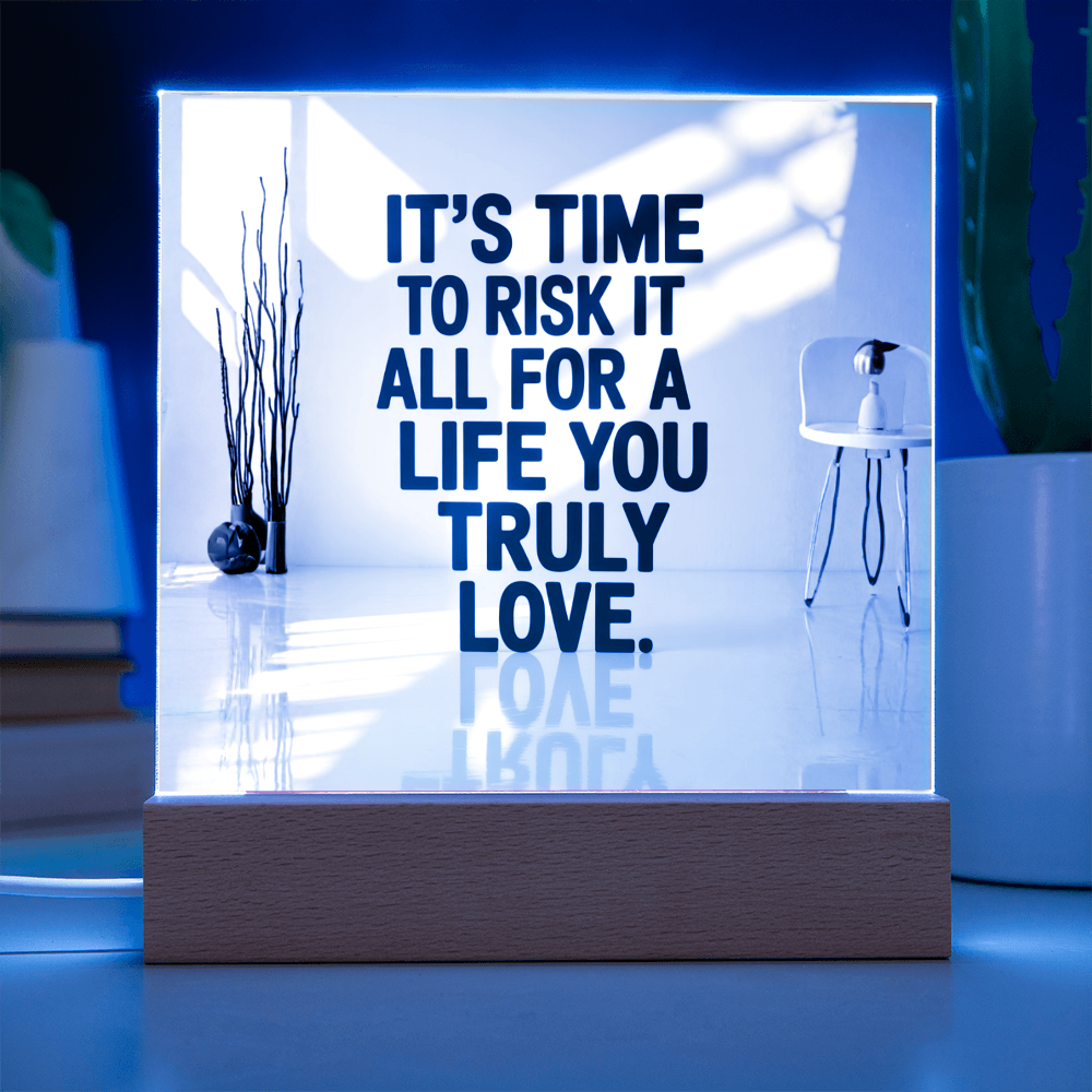 Wooden LED light base glowing with multiple colors illuminating acrylic plaque.