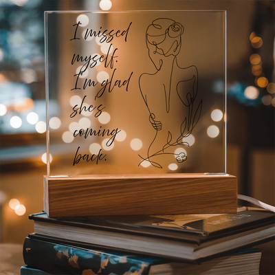 Self-love wall décor featuring quote about healing and rediscovery