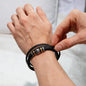Faith-inspired men’s bracelet made of braided vegan leather and stainless steel