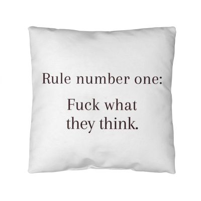 Motivational throw pillow with quote “F*ck What They Think” on soft polyester fabric.