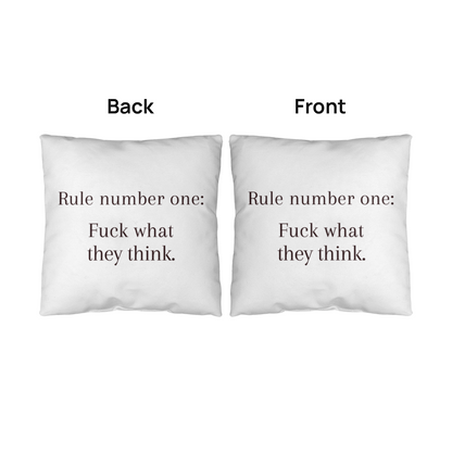 Close-up of bold typography design on modern motivational pillow.