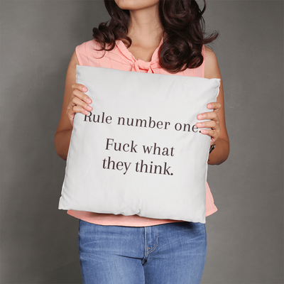 “Unbothered Energy” pillow on office chair or reading nook for bold workspace inspiration.
