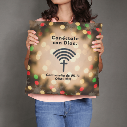 “Conéctate con Dios” pillow displayed on cozy holiday couch setup