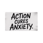 “Action Cures Anxiety” motivational gaming mat on modern desk setup