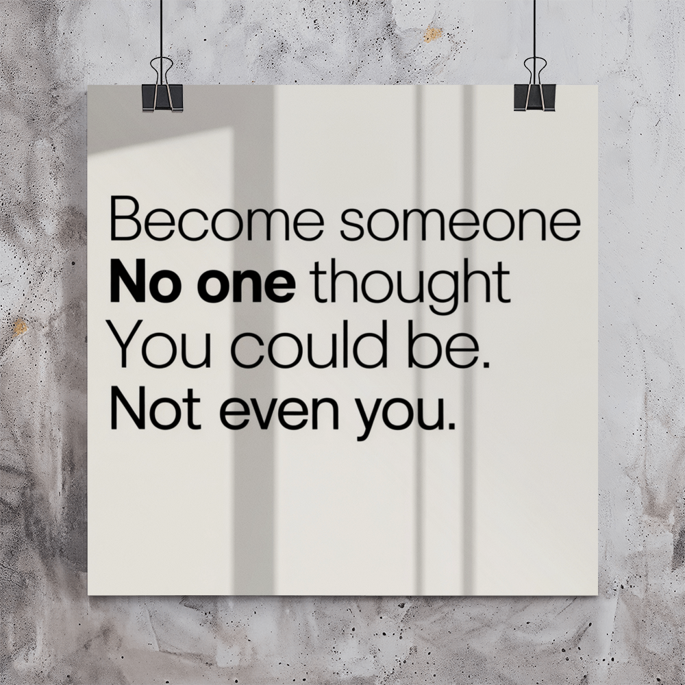 Inspirational poster hanging above desk in modern home office for motivation and self-belief.