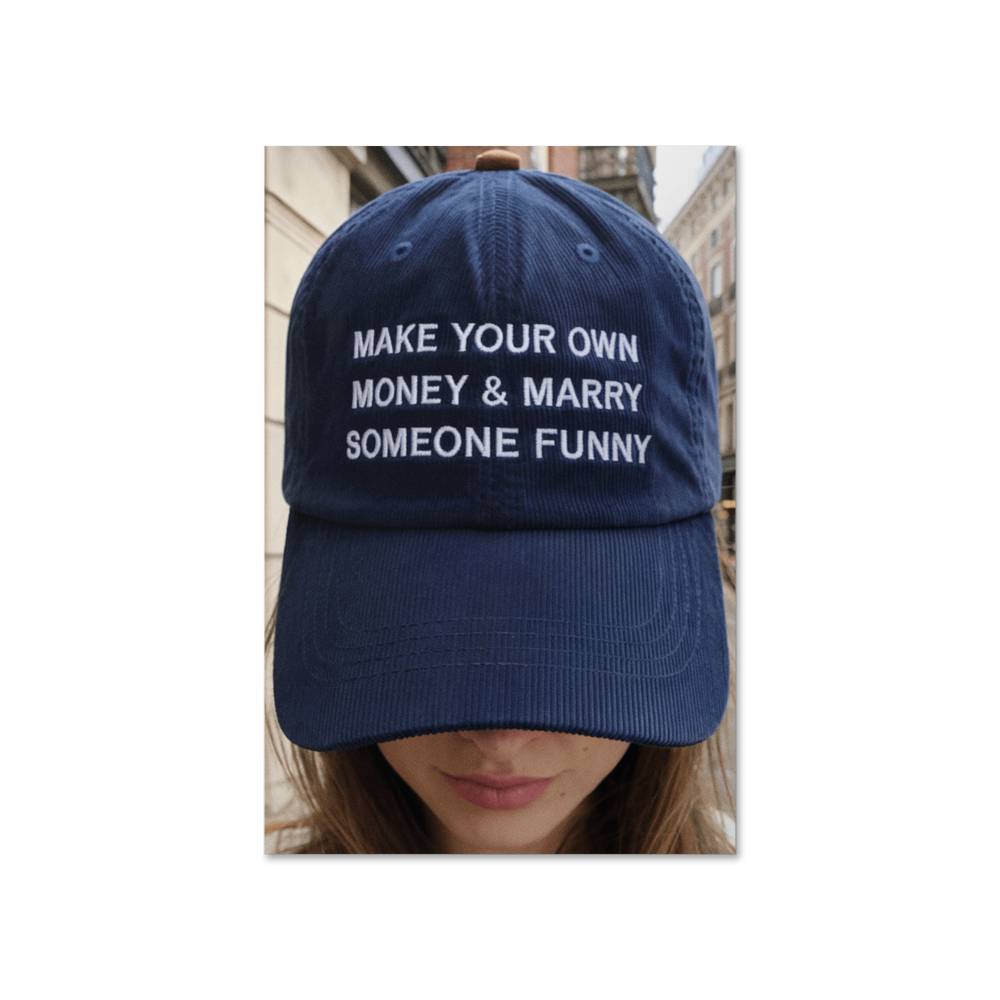 Make Your Own Money and Marry Someone Funny quote wall art hanging in neutral room setting with vase decor