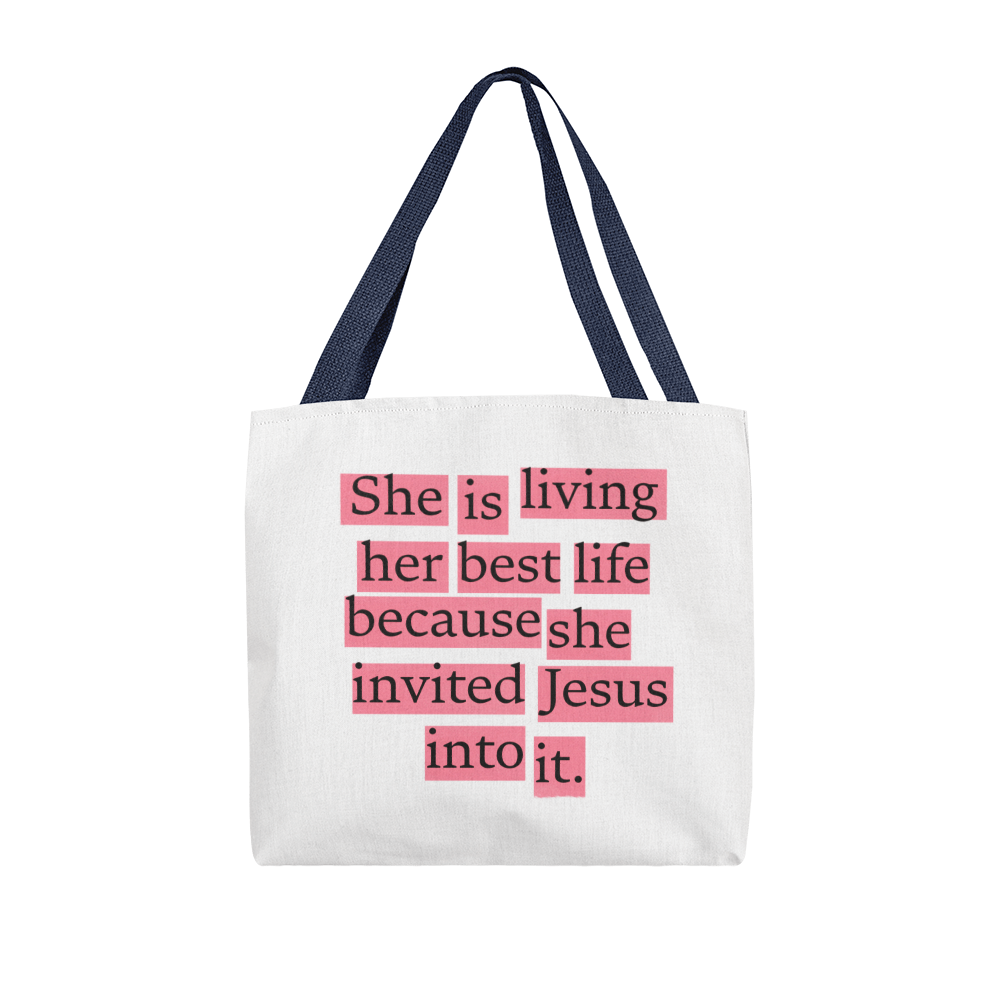Woman smiling while holding Christian tote bag during Sunday outing, expressing gratitude and joy.