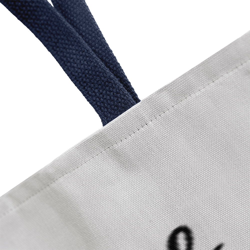 Tote displayed on white background with empowering message