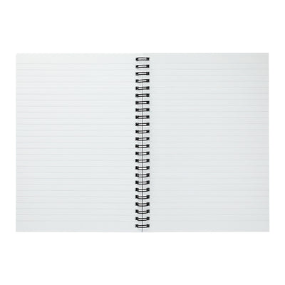 Motivational quote notebook reading “Switching from I can’t to I’ll learn”