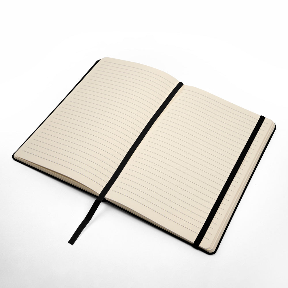 Elegant UltraHyde journal for ideas and reflections on wooden desk”