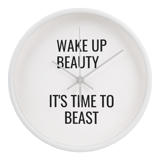 Motivational wall clock with quote “Wake Up Beauty, It’s Time to Beast” on wooden frame.