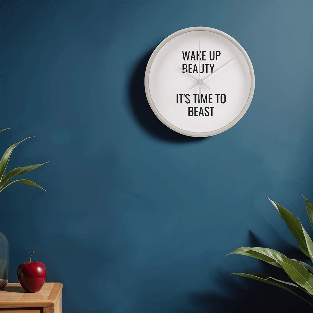 Close-up of modern wood clock face with bold motivational quote design.