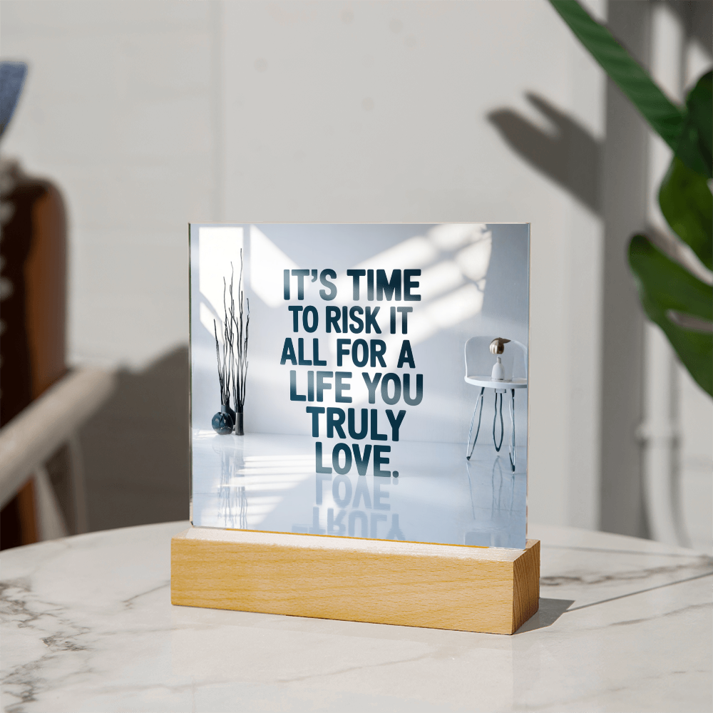 Motivational quote acrylic plaque glowing softly in dark room, creating ambient mood lighting.