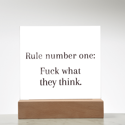 Motivational acrylic plaque glowing in rainbow LED light, symbolizing bold confidence and self-trust.