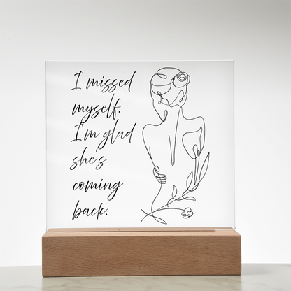 LED acrylic sign reminding her she’s coming back stronger and centered