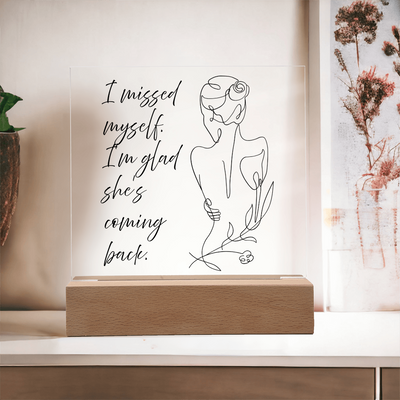 Elegant clear acrylic frame with empowering message of resilience