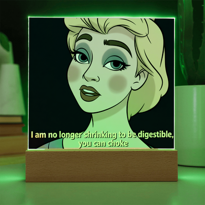 Feminist quote acrylic sign placed on vanity with perfume and jewelry, symbolizing confidence and self-love.