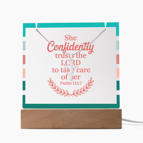 She Confidently Trusts the Lord acrylic plaque with glowing LED base and stainless steel cross necklace.