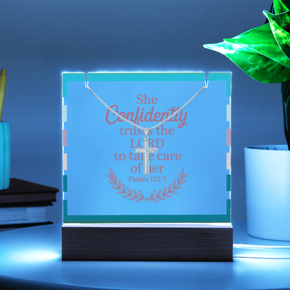 Acrylic plaque glowing in multiple light colors representing faith and hope.