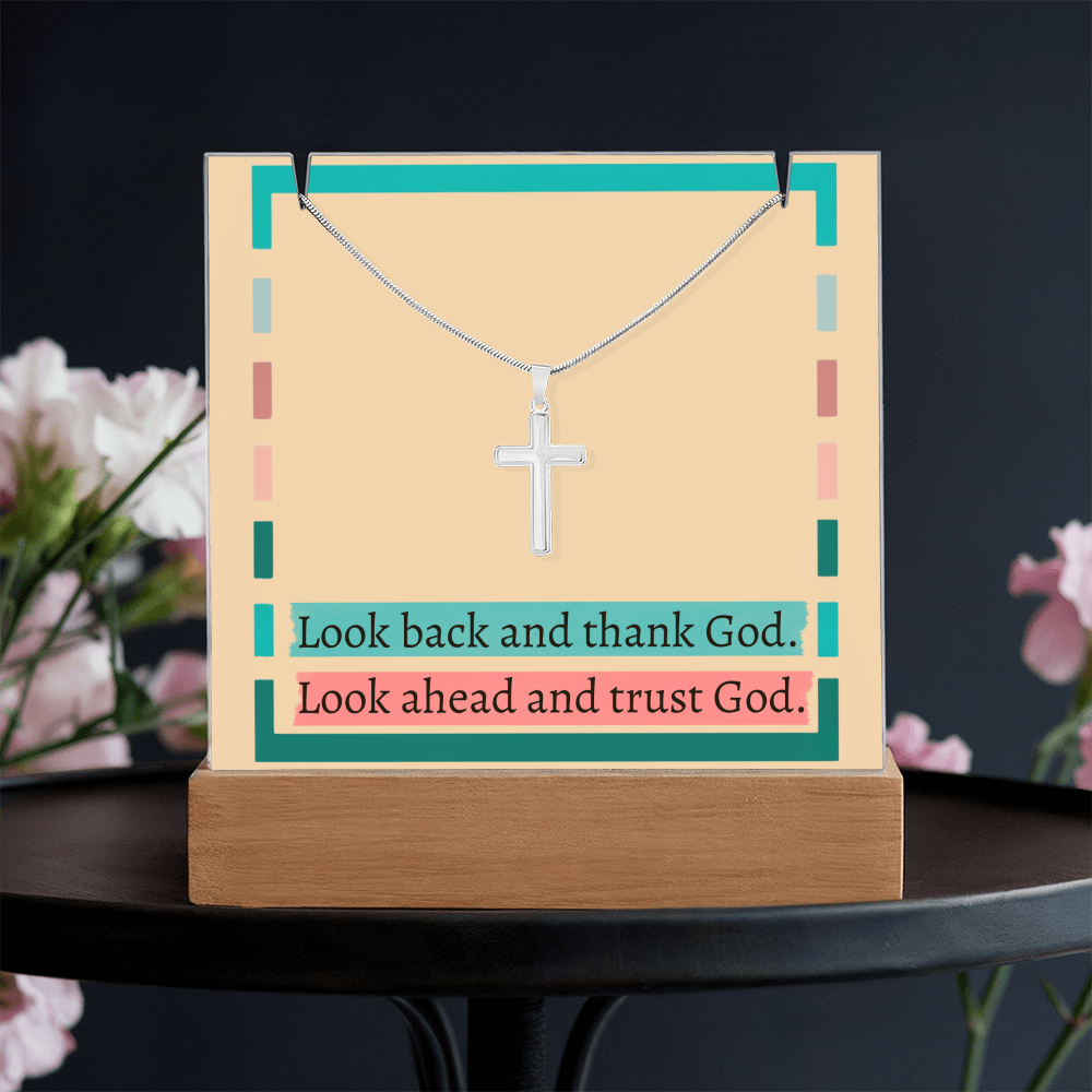 LED light display with “Thank God, Trust God” message on desk setup