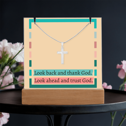 LED light display with “Thank God, Trust God” message on desk setup