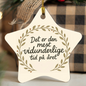 Star-shaped high gloss ornament with Danish holiday message