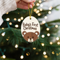 Wooden bear ornament with festive design close-up